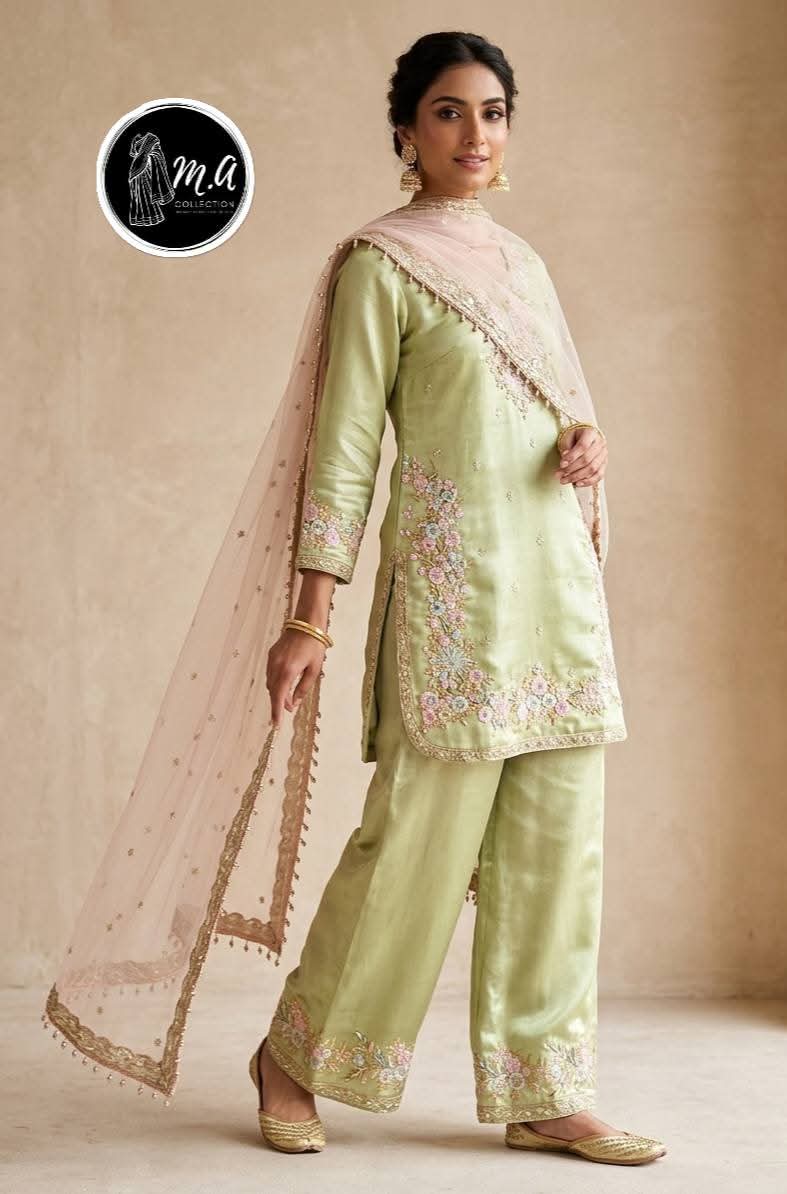 Pista green silk kurta set with blush net dupatta